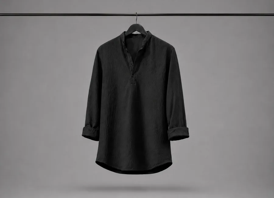 Black popcorn-textured short kurta with a mandarin collar, shown on a hanger